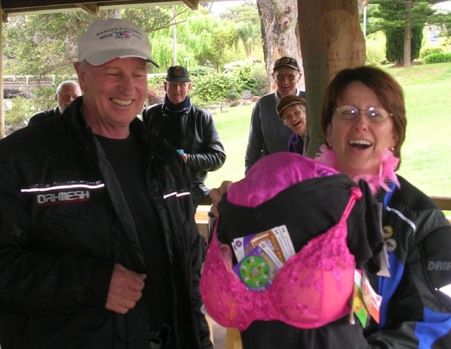 Raelene presenting Richard with his new-found support