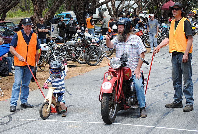 Don and young
          rider on the starting line.