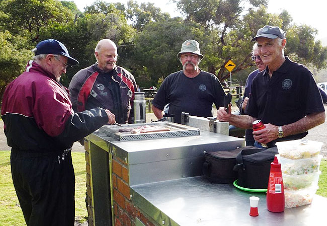 Blokes at an
          Aussie BBQ.