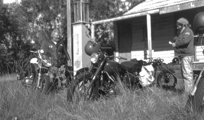 Ian Jury
          (Goldwing) and Barry May (BSA) at Narrikup, note the old
          petrol pump.