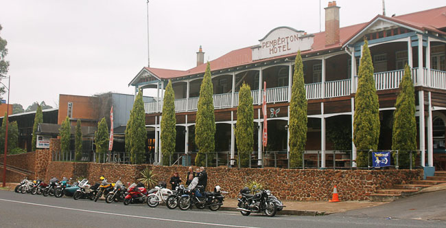 Bikes lined up
          outside the pub.