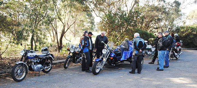 Checking out
          the three wheeler at the start.