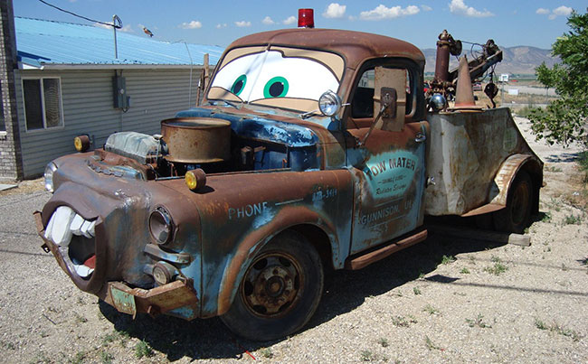 Looking like Mater from the movie “Cars”.