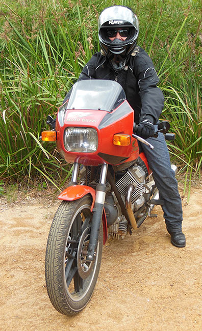 Chris Sainty
          on the Moto Guzzi.