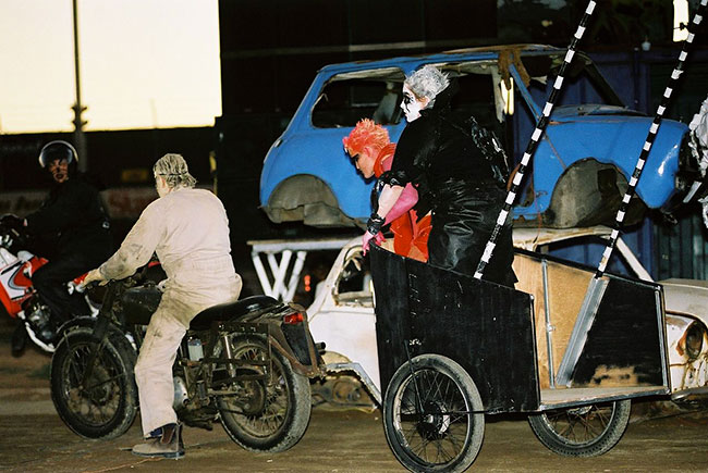 Dons friend on a BSA towing a
          chariot!