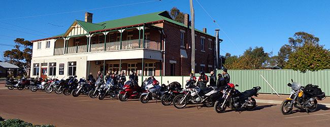 The crew's motorbikes at the pub.