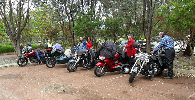 Bikes and riders in a rare dry moment.