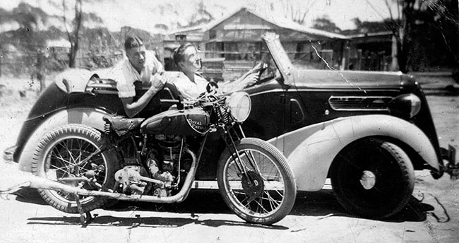 A Royal Enfield motorbike and a Standard 10 car.