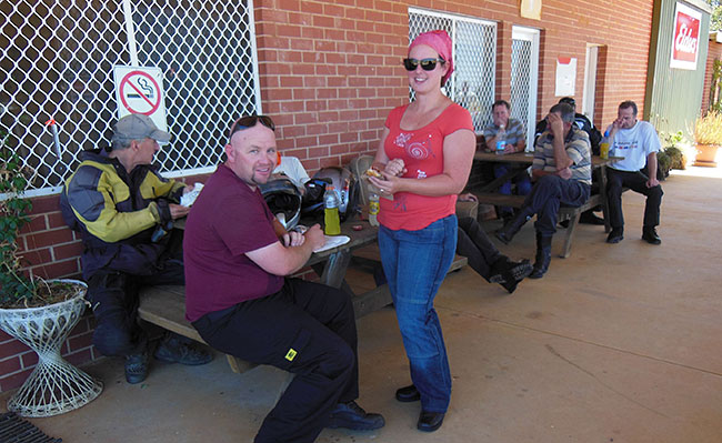 Matt and Brooke enjoying a cool drink at Boxwood
          Hills.