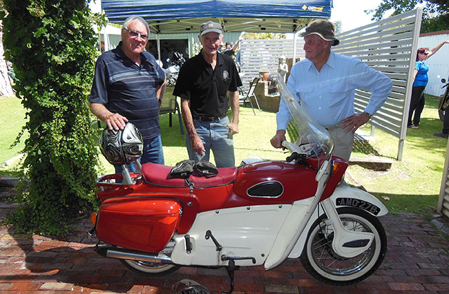 Clive, Phil and Des admiring Steve Collin's Ariel
          Leader.