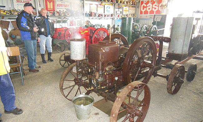 Andrew and Don admiring a beautiful old machine in
          full steam.