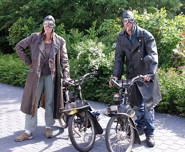 Antoinet and Ronnie looking like dags with Solex
          motorbikes.