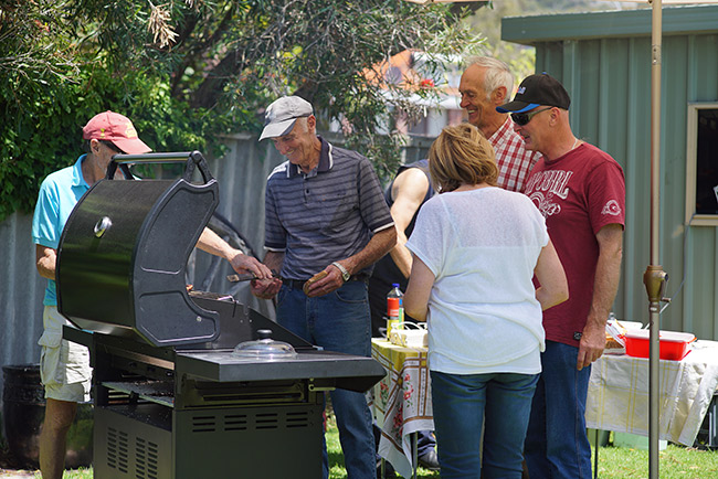 Sausage Sizzle was popular with David doing a great
          job cooking.