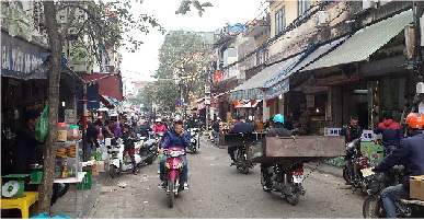 Vietnamese
          chaotic street scene.