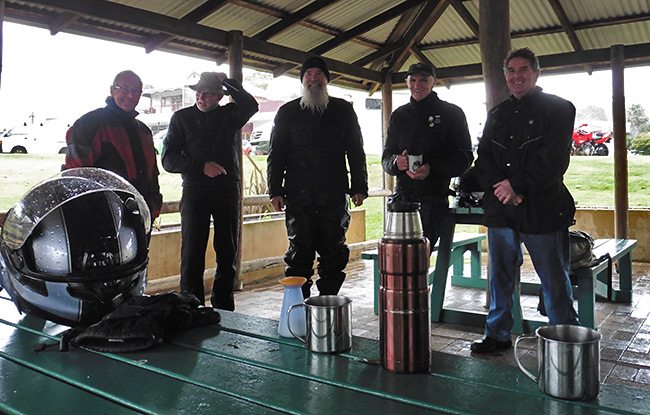 A soggy Mike, Ian, Bob, Phil and Geoff.