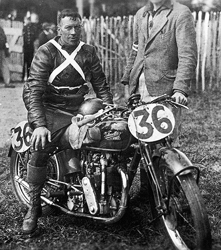 Jim Alexander
          in the paddock at the Isle of Man at the 1935 Manx GP.