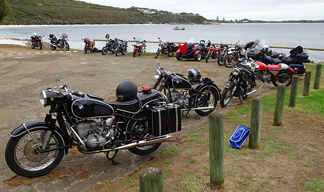 Lineup of (mostly old) motorbikes.