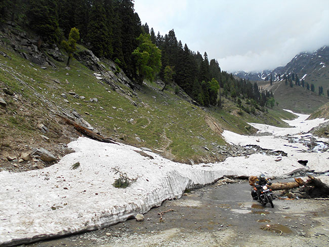 Riding in the snowy river.