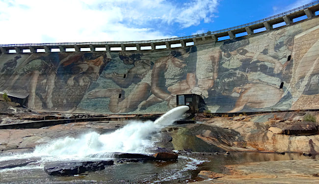 Colourful dam wall.