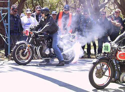 Paul Morrell warms the Kawasaki's back tyre on departure...