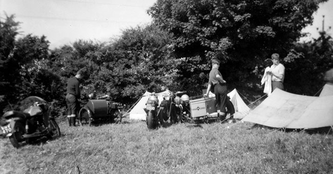 Camping at the IOM TT in 1965, the bikes are 250cc Royal Enfield, 1928 Douglas, 1936 Manx Norton and Chater-Lea sidecar outfit.