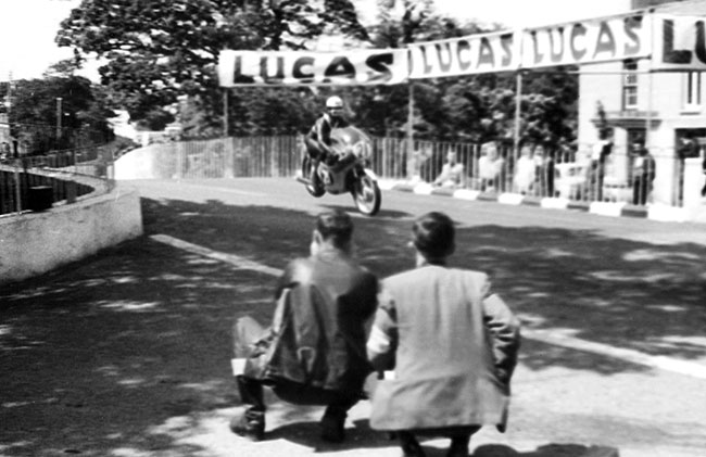 Photographers capturing the action at Ballaugh Bridge, 1965.