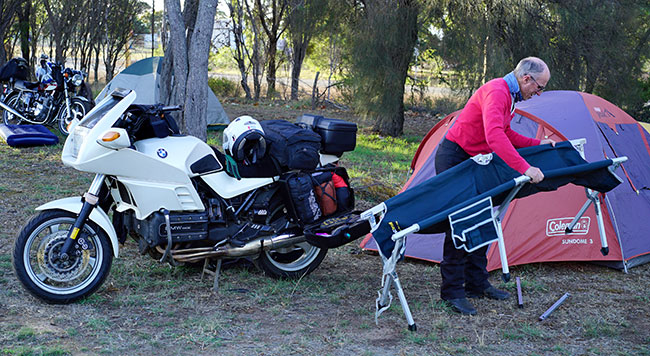 Bob Boyes attempting to fit a camper bed into his tent!