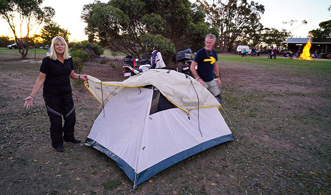 Louise and John putting up their tent.