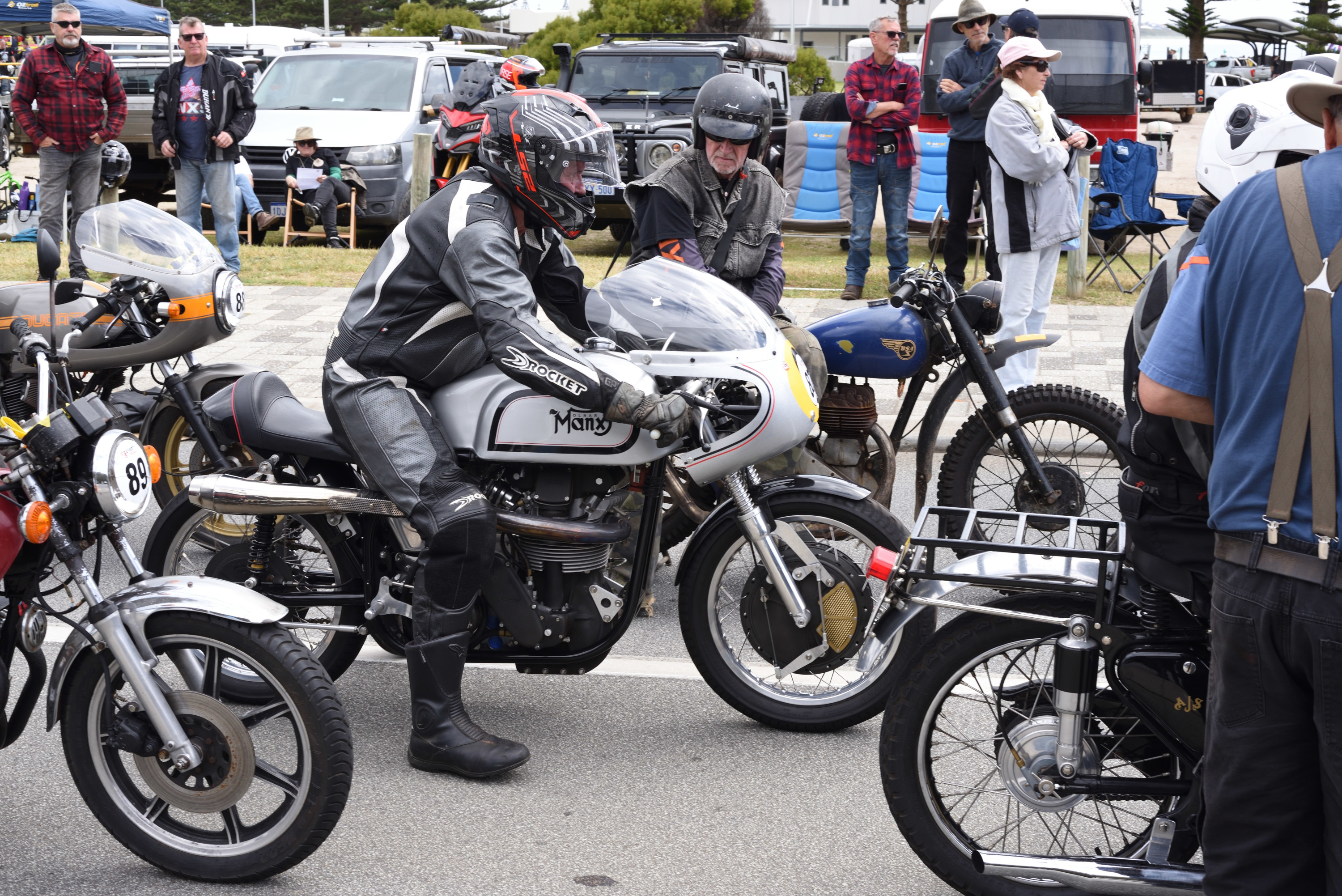 Very racy Manx Norton alongside BSA
        side valve.