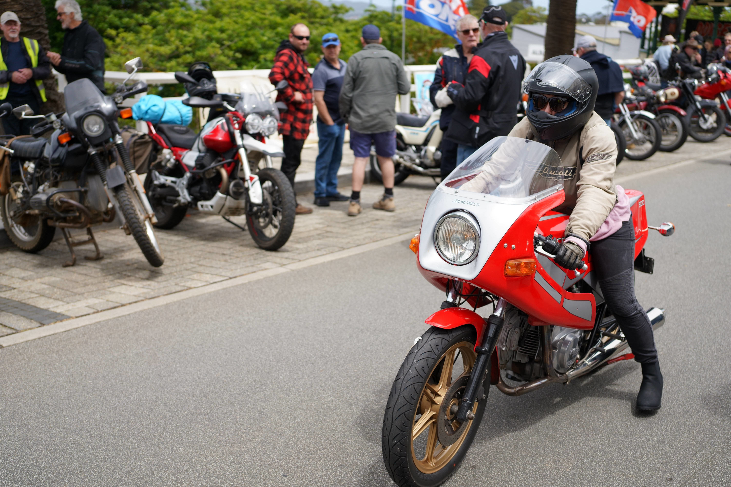 Ducati rider arriving at Stirling
        Terrace.